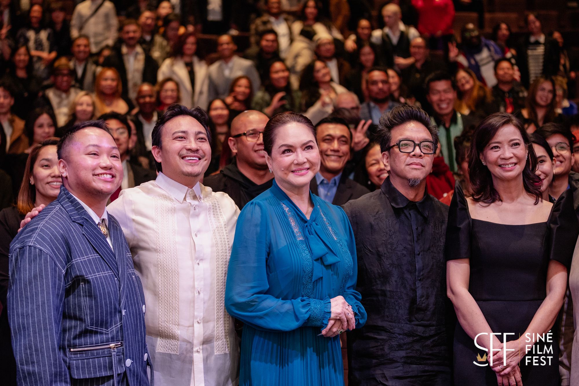 Filmmakers and guests in front of a full house at Siné Film Fest
