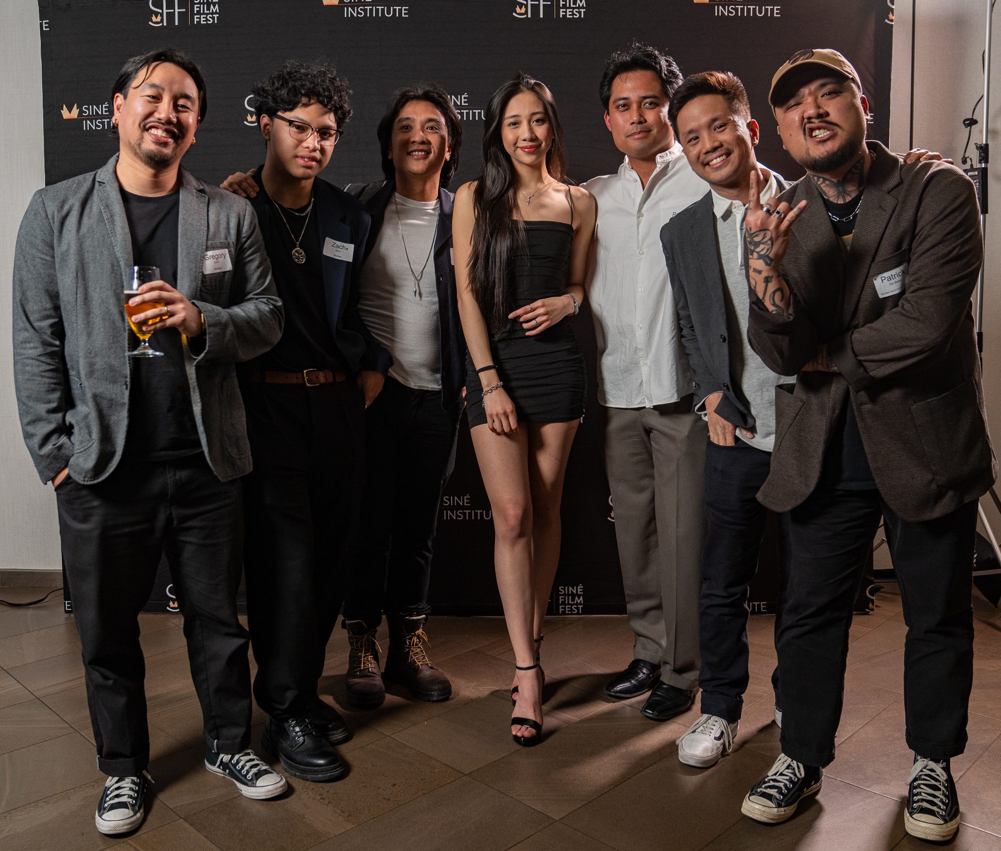 Filmmakers and guests at the Siné Institute and Siné Film Fest media wall