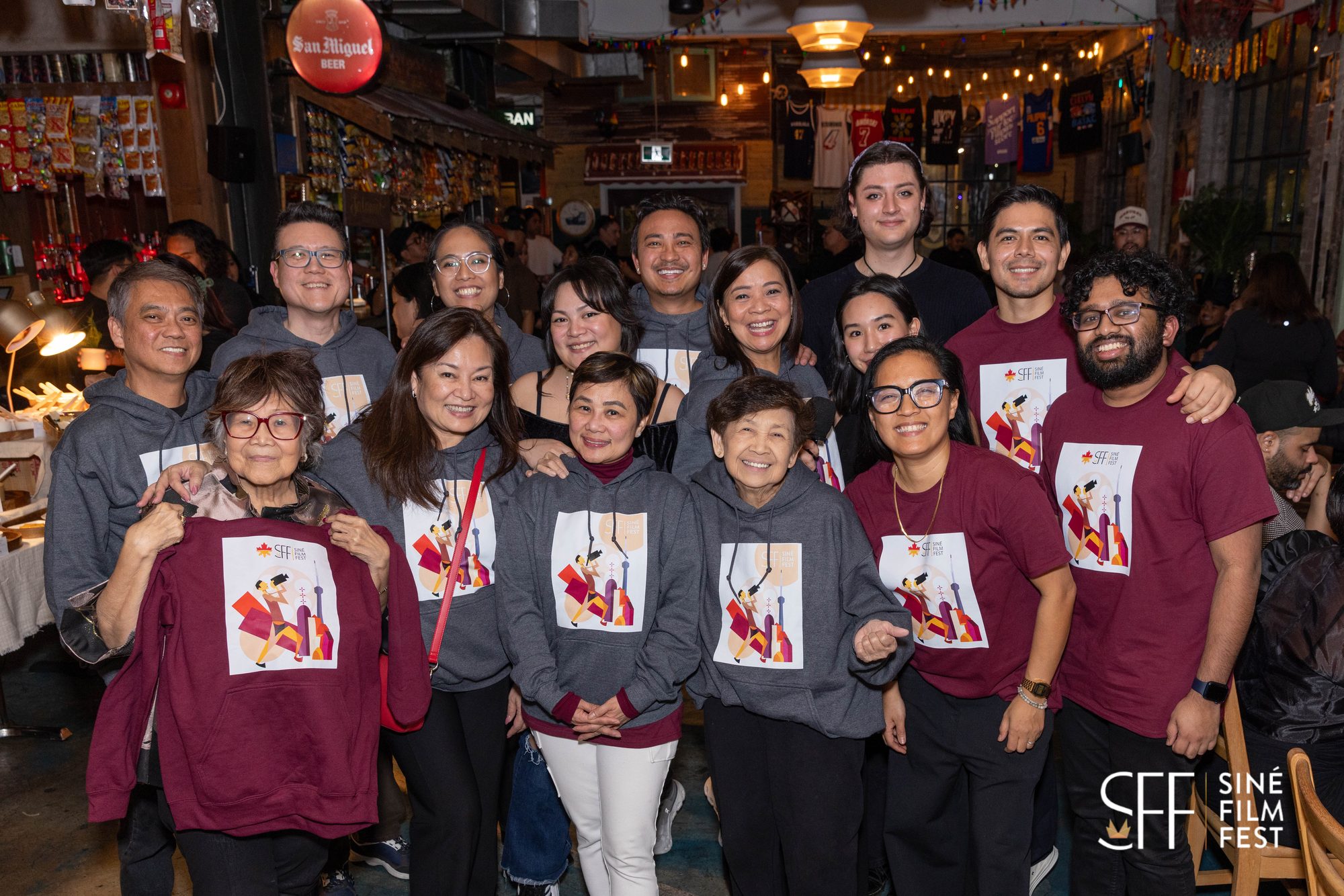 The Siné Film Fest team and volunteers in festival hoodies and shirts