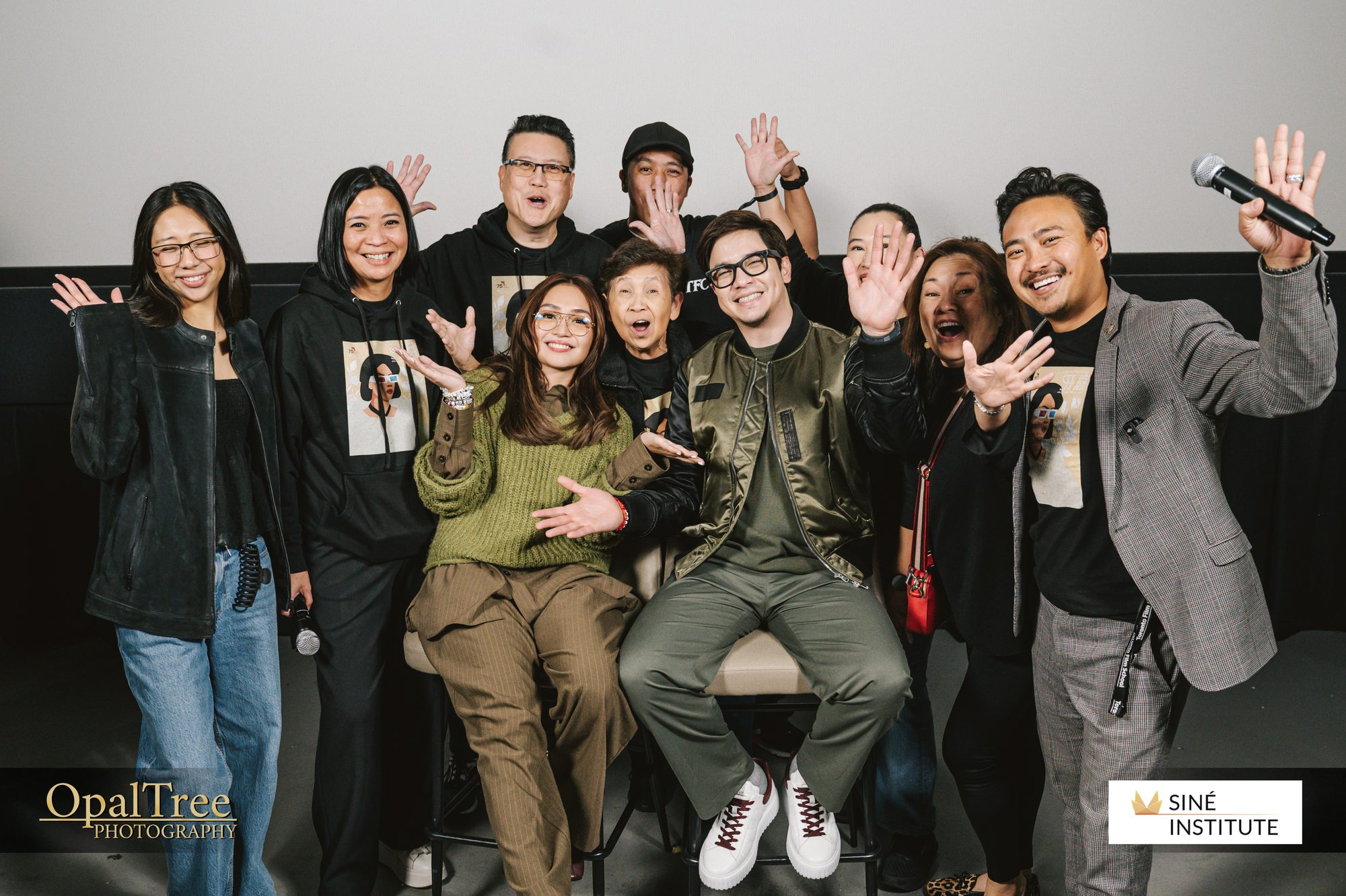 Filmmakers and guests waving after a Siné Film Fest screening