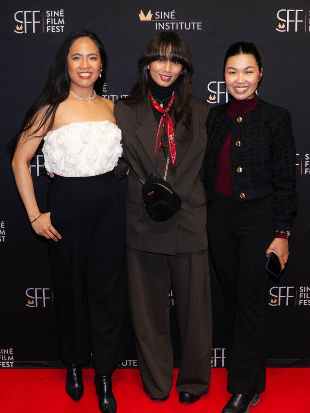 Three guests on the red carpet
